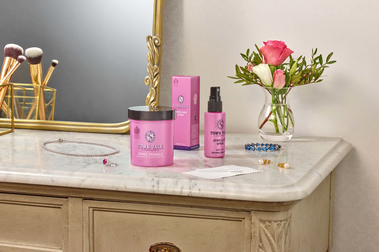 Town Talk Polish Jewellery Care Lifestyle Shot with Jewel Sparkle and Jewellery Spray on Marble Vanity Table with Jewellery and Roses